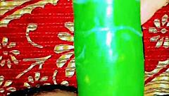 She explores with a cucumber in homemade setup as cute exotic slave