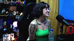 Martina Olivera offers two reais or a mysterious gift in her outdoor public podcast interview. She chats in the shack with teen guests.