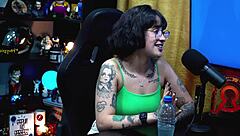 Martina Olivera offers two reais or a mysterious gift in her outdoor public podcast interview. She chats in the shack with teen guests.