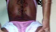 Lola performs a seductive ebony striptease dance, ripping clothes in petite solo undressing.