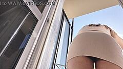 Watch this hot Latina babe flaunt her ass and pussy on the balcony without panties! Can you handle her fetish tease?