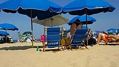 Hey, check this candid bikini slut at the beach 😏