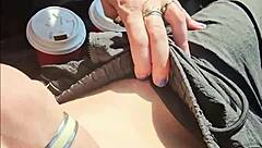 kontessa goes barefoot on the beach with driftwood, giving a handjob to that big canadian cock until cumshot