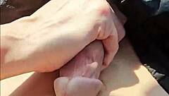 kontessa goes barefoot on the beach with driftwood, giving a handjob to that big canadian cock until cumshot