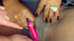 Sexy black model shoves vibrator deep in shaved pussy for white guy watching!