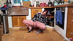 German curvy redhead with huge natural boobs masturbated to orgasm with banana insertion in kitchen, then got fucked roughly.