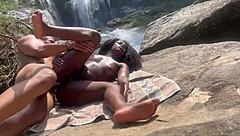 Ebony goddess gives her tight pussy in public at the waterfall with amateur interracial teen action 😏