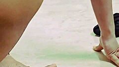 Young Indian teen bends over, showing wet pussy in solo play.