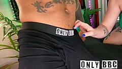 redhead with that big round ass, playing around with a massive black cock...