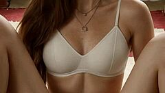 Fancy eastern european lingerie model shows off panties and barefoot style.