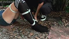 he caught the cute blonde teen outdoors and punished her by tickling her pretty feet until she moaned.