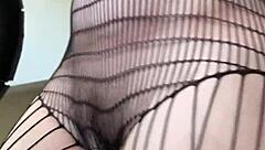 Athletic brunette milf dives into a fetish workout session with fishnets and fitness moves in her European housewife routine