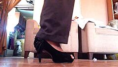 I love strutting in my black high heels as a shemale...