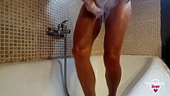 Nippleringlover, the hot milf with huge pierced nipples, shaves her pierced pussy in a steamy session.