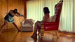 in this scene, the dominatrix mistress april straps on latex gear to dominate her bound ebony slave with strapon fucking and deepthroat sucking