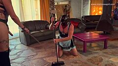 in this scene, the dominatrix mistress april straps on latex gear to dominate her bound ebony slave with strapon fucking and deepthroat sucking