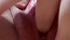 she's rubbing her clit up close, getting all wet and cumming hard in solo session