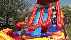 Lesbian Beauties Toying Each Other Pussies with Strapon and Dildo in Outdoor Anal Group Kissing