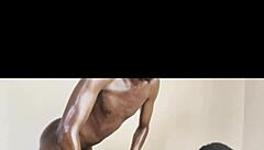 ebony masseuse bends over for big black cock in submissive doggystyle.