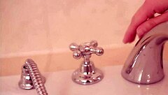 sweety loreen relaxes in the bath while gently touching herself for a soothing moment.