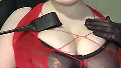 suggestive riding crop teasing ass and tits