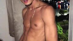 Who knew this naughty boy would jerk off right at the building window for everyone