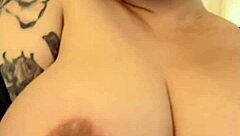 Busty blonde shows off her big natural tits in a sexy display.