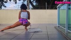 Brunette teases with shorts tucked up her curvy ass during outdoor training