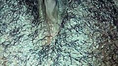 Man, this ebony babe plays with her hairy wet pussy in homemade solo until she orgasms hard.