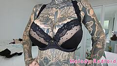 melody radford tries on black and purple lingerie plus micro bikini in this solo haul