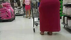 She struts down the street showcasing her PHAT BOOTY in a pink see-through dress, all caught candidly on hidden cam