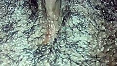 Man, this ebony babe plays with her hairy wet pussy in homemade solo until she orgasms hard.