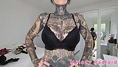 melody radford tries on black and purple lingerie plus micro bikini in this solo haul