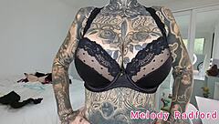 melody radford tries on black and purple lingerie plus micro bikini in this solo haul