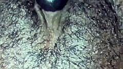 Man, this ebony babe plays with her hairy wet pussy in homemade solo until she orgasms hard.