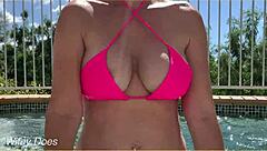 Hey, check out my wife flashing her big tits in the hotel pool during our daring public exhibitionist adventure.