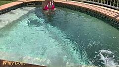 Hey, check out my wife flashing her big tits in the hotel pool during our daring public exhibitionist adventure.