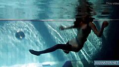 Hey there, check out this hot Hungarian teen 18+ named Petra chilling in the swimming pool with her tight, shaved body on display.