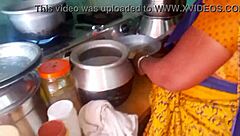 in the kitchen, desi bhabhi heats up homemade sex with her husband while cooking as roommate watches.