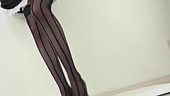 Japanese woman in stockings and heels crushes a hamburger under her feet in fetish food play