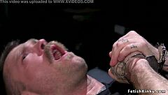 The blonde mistress takes control, sliding her fingers deep into the bound male sub's ass for total domination