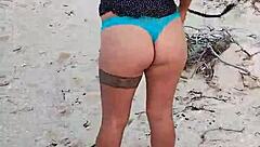 Exhibiting on Mexican beach showing tits and ass in lingerie