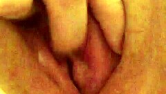 In a quiet moment, the solo girl gently explores her moist and inviting area with careful fingers