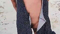 Exhibiting on Mexican beach showing tits and ass in lingerie