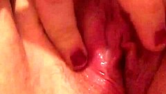 In a quiet moment, the solo girl gently explores her moist and inviting area with careful fingers