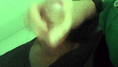 In the mall bathroom, the security guard casually takes a break to masturbate solo.