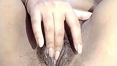 Amateur girl fingers her wet pussy in homemade video until squirting orgasm with dripping clothes ripped off