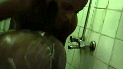 Two horny booty african lesbians are kissing and getting wild under the shower with natural tits play