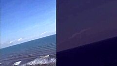 Brazilian pornstar Priscila Belini strips naked on beach for public outdoor masturbation with skinny body details.