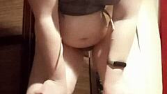 Camgirl in Grey Teases with Sensual Ass Fingering